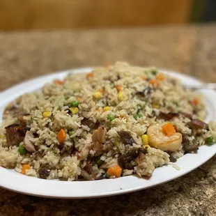 a plate of rice and vegetables