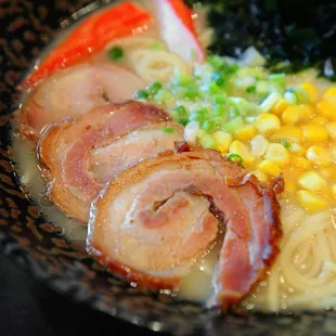 a close up of a bowl of ramen