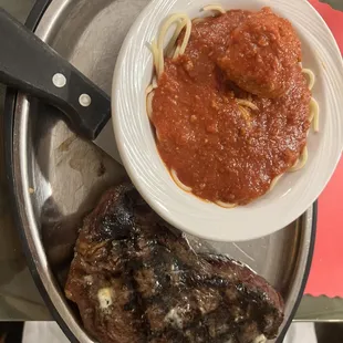 Good looking but tough as leather New York Strip and side of Spaghetti.