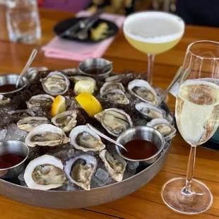 Happy Hour oysters, $25 for half dozen. Fresh!