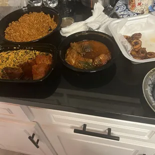 Jollof Rice &amp; Assorted Meat Egusi  with white rice . Food flavor ambience and service were great.