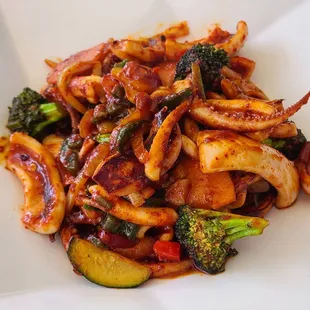 a plate of stir fried vegetables