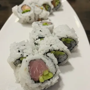 a close up of a plate of sushi