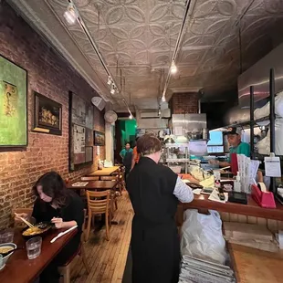 a man and a woman in a restaurant