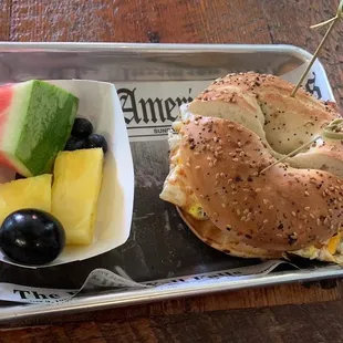 a bagel, fruit, and watermelon