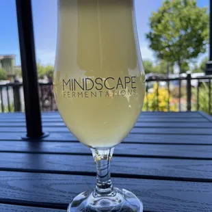 a glass of wine on a table