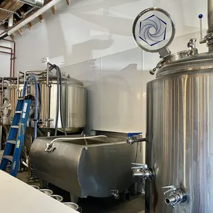 a man holding a can of beer