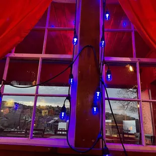 blue lights on a wooden pole