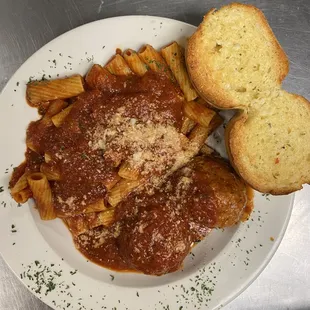 a plate of pasta and bread