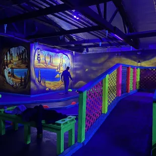 a man standing in a brightly lit room