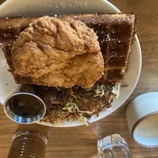 Chicken and waffles with extra crispy hash browns and a side of gray- heaven!