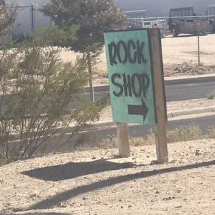 Sign. Look for this to enter pn a dirt driveway.