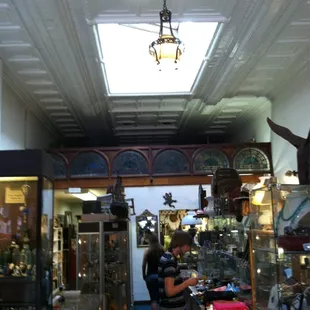 20 foot tin ceilings, 7k sq feet of killer goodies.