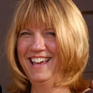 Debra E.