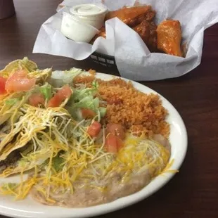 The taco platter and hot wings. Mmm, mmm...