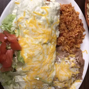 Chicken chimichanga dinner plate with rice and beans