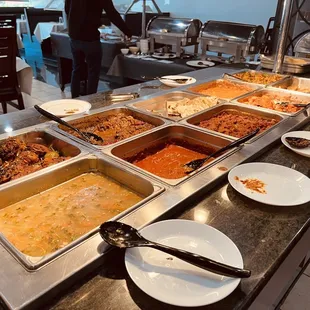 a buffet with a variety of dishes