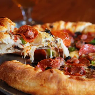 a slice of pepperoni pizza