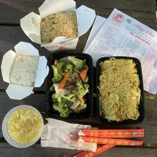 a variety of food items on a picnic table