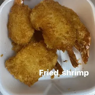 fried shrimp in a styrofoam container