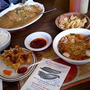 Lunch  yummy  Sizzling Rice  Soup , Crab Rangoon n Chicken Egg Foo Young you go now Delicious