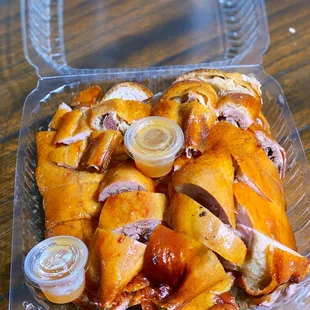 a plastic container filled with chicken