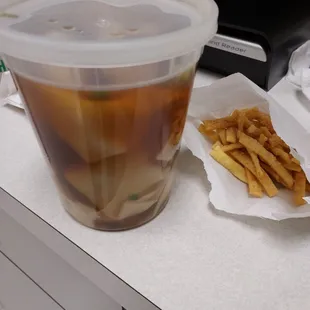 A large wonton soup to go.