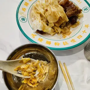 a plate of food and a bowl of soup