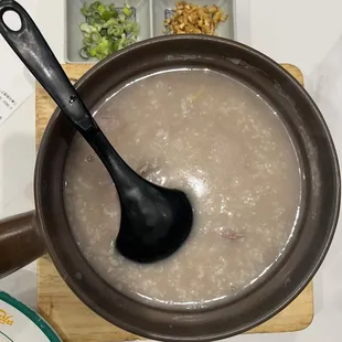 a bowl of soup with a spoon
