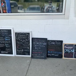 chalkboard menus on sidewalk