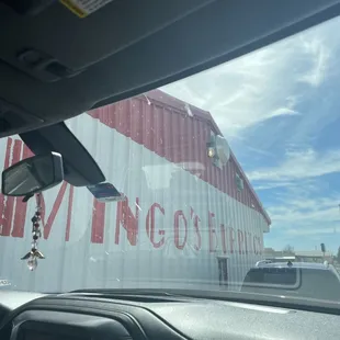 a view of a truck from inside a car