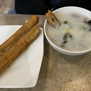 Congee (rice porridge) and youtiao (Chinese donut).