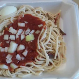 Ming's "Pork Yat-A-Mein". Completely inedible unless you like noodles with ketchup and raw onions.