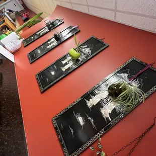 a long table with a red table top