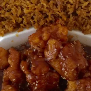 Sesame chicken and pork fried rice with a egg roll off the lunch menu