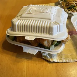 So much fish, they had to use a rubber band to keep the container closed.