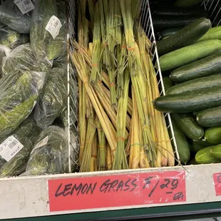 a display of cucumbers and other vegetables