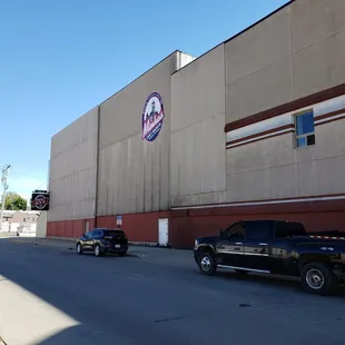 trucks parked in front of the building