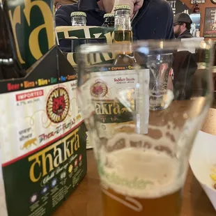 a man drinking a beer