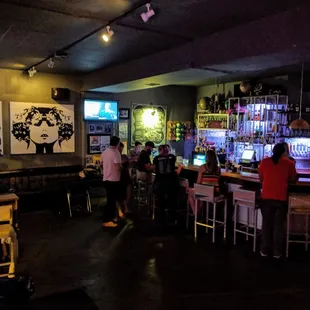 people sitting at the bar