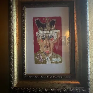 a portrait of a man with a crown on his head