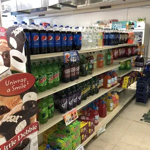 a variety of sodas and soft drinks