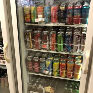 a variety of sodas and soft drinks