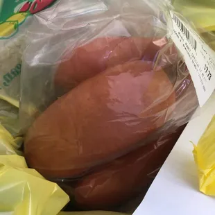 hot dogs wrapped in plastic