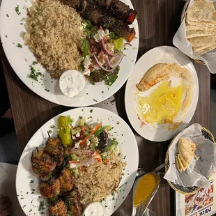 Beef and chicken kebab platter and 3/4 of a hummus app platter (sorry couldn&apos;t wait)