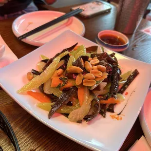 Celery, fungus, carrots, and peanuts salad