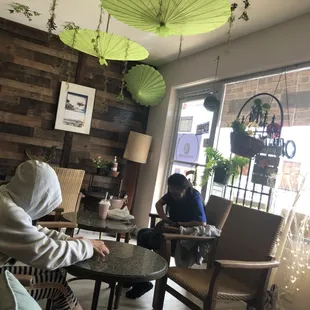 Customers working and relaxing using our wifi