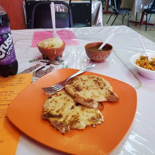 Cheese &amp; bean pupusa, cheese pupusa, rice, green salsa, and curtido.