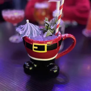 a cup with a drink in it