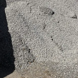 Screenings - hardens when wet to a hard surface ie: pathways